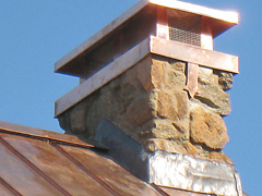 Close up of chimney cap. Please note lead flashing at rock chimney. This is the only way to effectively flash a rock chimney.