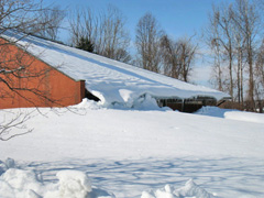 Church of the Incarnation after February 3, 2010, 37 inch snowfall. Severe damage to the gutters and copper roofing we installed in 1994.